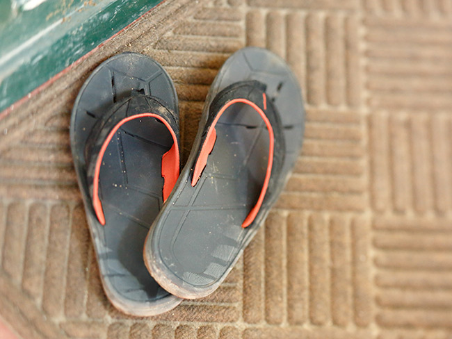 thong sandals on a doormat